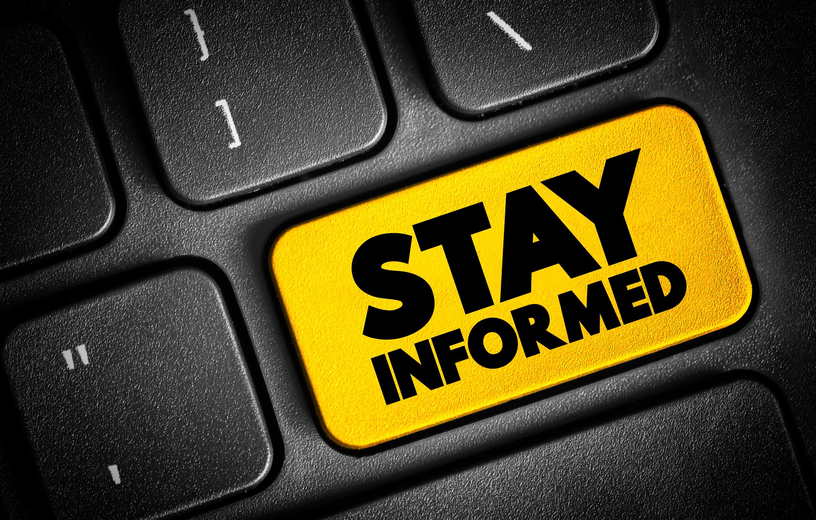 Photo of Keyboard with words - Stay Informed